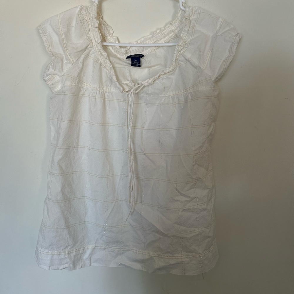American Eagle outfitters white blouse with Tental detail throughout size 0